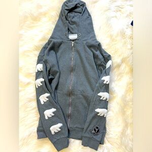 Yellowknife brand with cute polar bears down the arms.